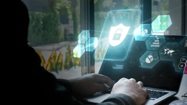 A man working on a security program