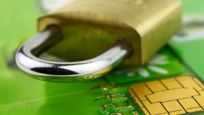 A lock on top of a bank card