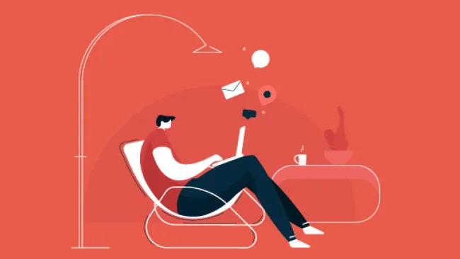 A man working while on the couch