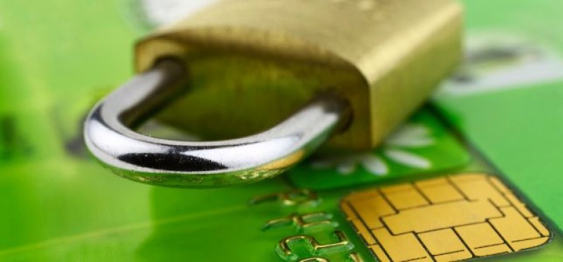 A lock on top of a bank card