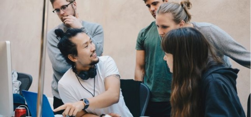 Someone explaining something to the team