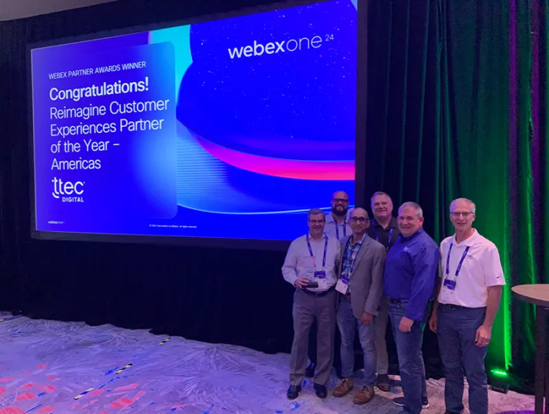 Mall Tech Global Digital’s Cisco team accepts the award for Reimagine Customer Experiences Partner of the Year